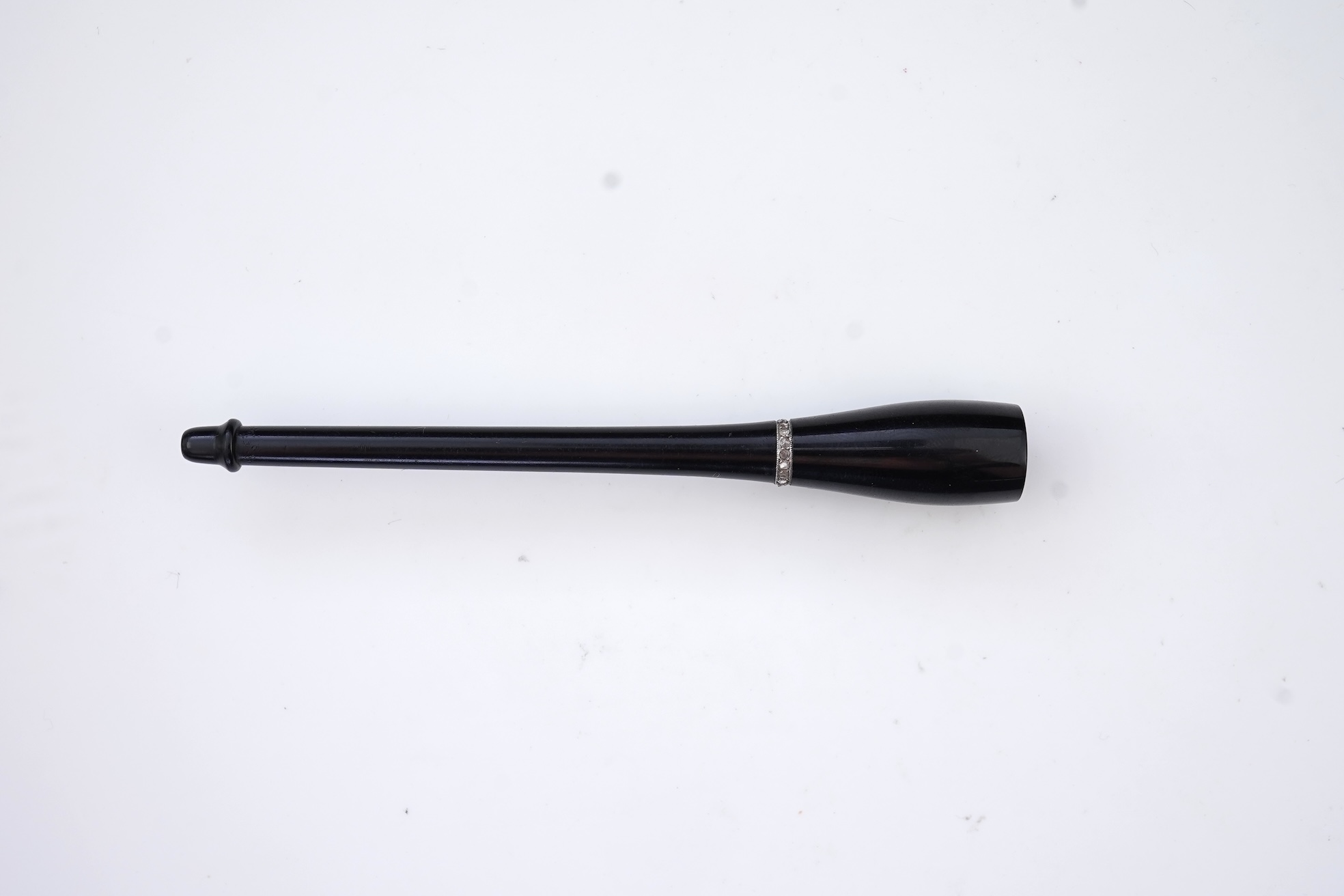 An Art Deco jet and diamond cigarette holder, 1920s